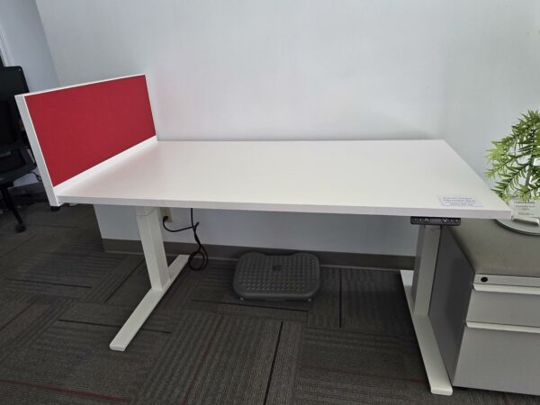 Knoll Electric Height Adjustable Desk - White w/Red privacy screen/tack board and a pedestal cabinet - 58"W x 29"D - Height adjustable between 25" and 48.5" - $575.00/set. - Image 2