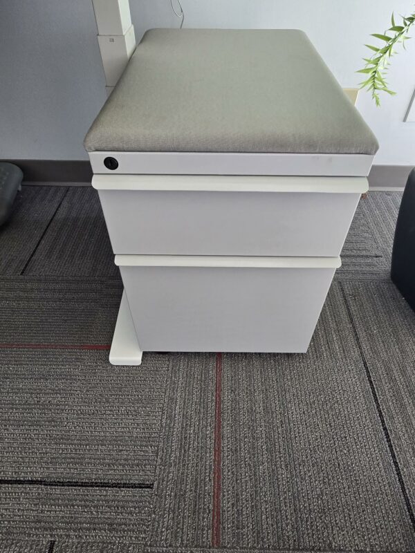 Knoll Electric Height Adjustable Desk - White w/Red privacy screen/tack board and a pedestal cabinet - 58"W x 29"D - Height adjustable between 25" and 48.5" - $575.00/set. - Image 3
