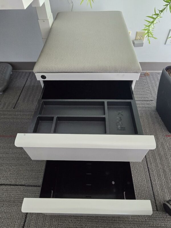 Knoll Electric Height Adjustable Desk - White w/Red privacy screen/tack board and a pedestal cabinet - 58"W x 29"D - Height adjustable between 25" and 48.5" - $575.00/set. - Image 4