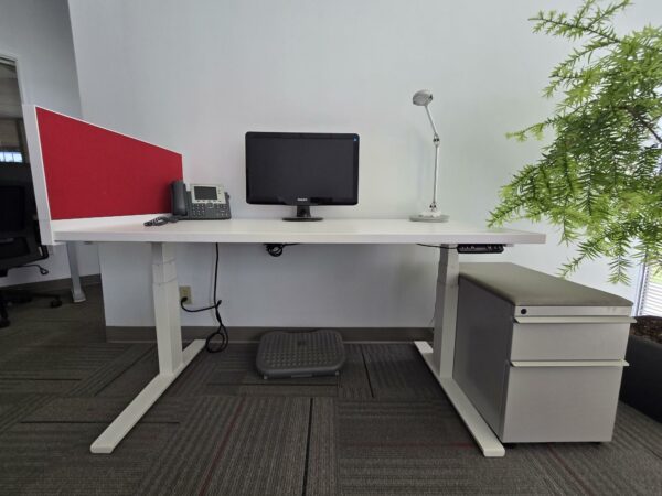 Knoll Electric Height Adjustable Desk - White w/Red privacy screen/tack board and a pedestal cabinet - 58"W x 29"D - Height adjustable between 25" and 48.5" - $575.00/set. - Image 5